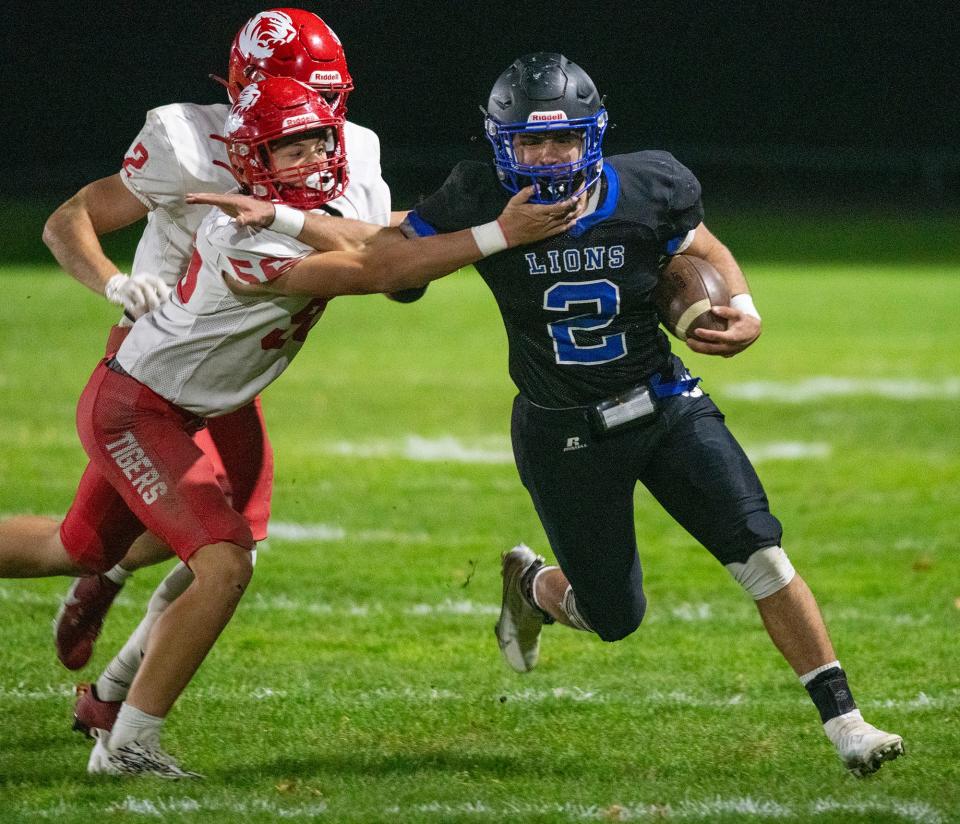 WEST BOYLSTON - West Boylston’s Jamie McNamara runs for a first down in the first quarter at home Friday, October 13, 2023.