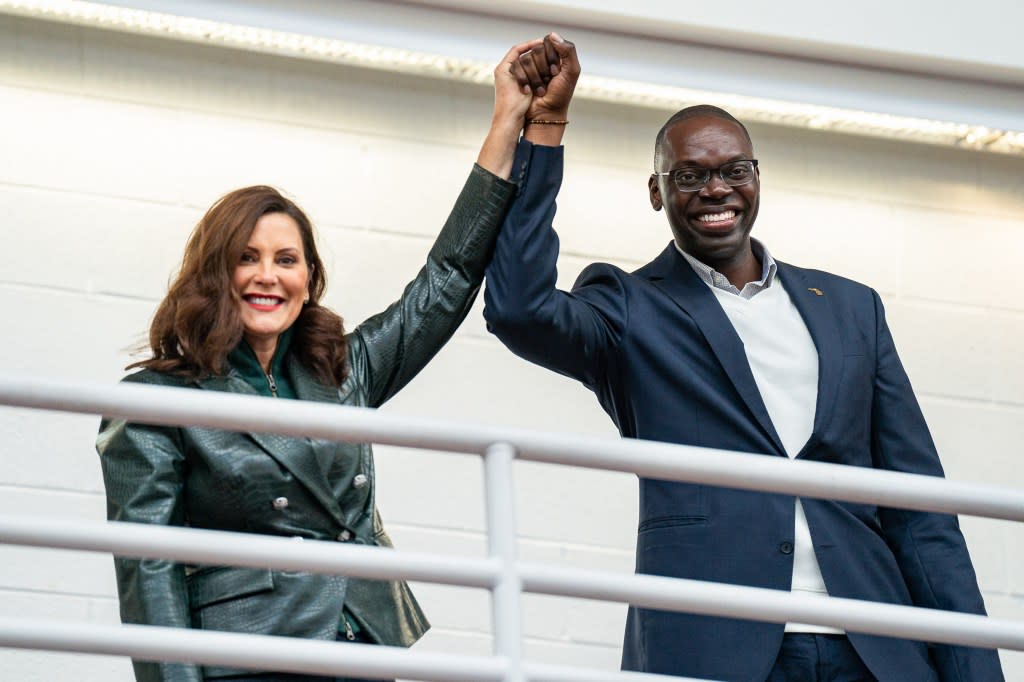 Governor Gretchen Whitmer (L) and Lieutenant Governor Garlin Gilchrist II (R) gesture during the rally. Michigan Democrats hold a Get Out the Vote Rally for Governor Gretchen Whitmer with President Barack Obama ahead of the 2022 midterm elections. (Photo by Dominick Sokotoff/SOPA Images/LightRocket via Getty Images)
