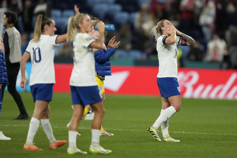 England's Millie Bright, right, reacts after the Women's World Cup Group D soccer match between England and Denmark at the Sydney Football Stadium in Sydney, Australia, Friday, July 28, 2023. England won the match 1-0. (AP Photo/Rick Rycroft)