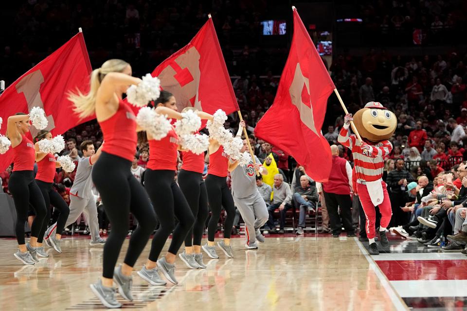 Jan 5, 2023; Columbus, OH, USA;  Brutus Buckeye and the spirit squad perform at a timeout during the NCAA men's basketball game between the Ohio State Buckeyes and the Purdue Boilermakers at Value City Arena. Purdue won 71-69. Mandatory Credit: Adam Cairns-The Columbus Dispatch