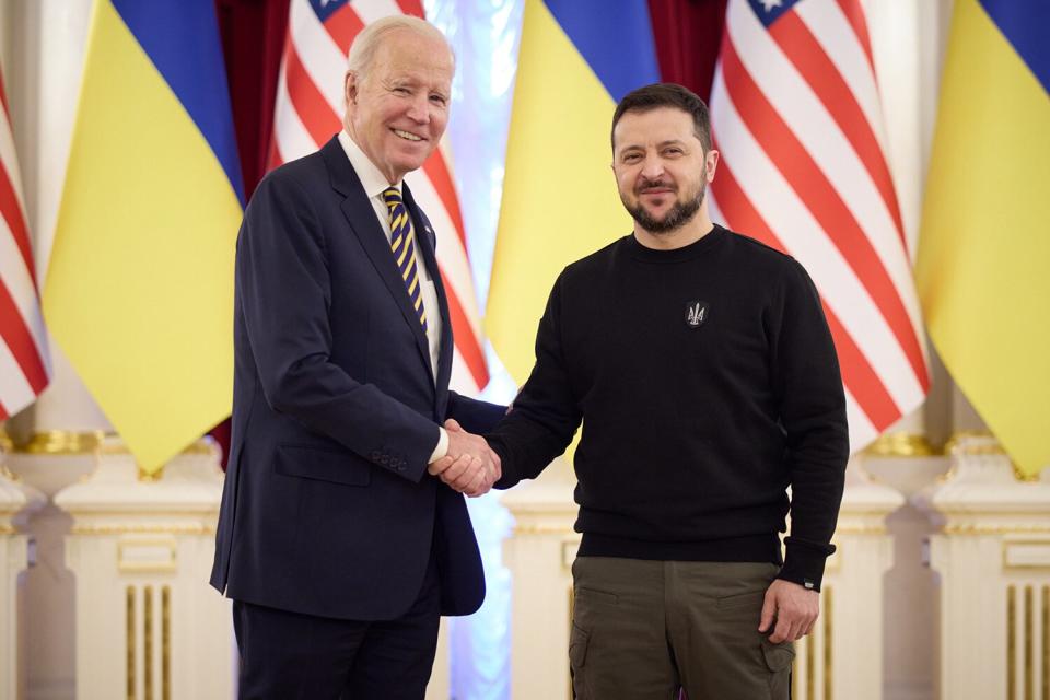 In this handout photo issued by the Ukrainian Presidential Press Office, U.S. President Joe Biden meets with Ukrainian President Volodymyr Zelensky