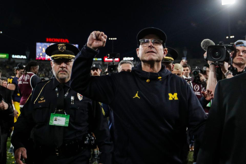 Michigan coach Jim Harbaugh waves to fans to celebrate the 27-20 Rose Bowl victory over Alabama in the 2024 Rose Bowl in Pasadena, California, on Monday, Jan. 1, 2024.