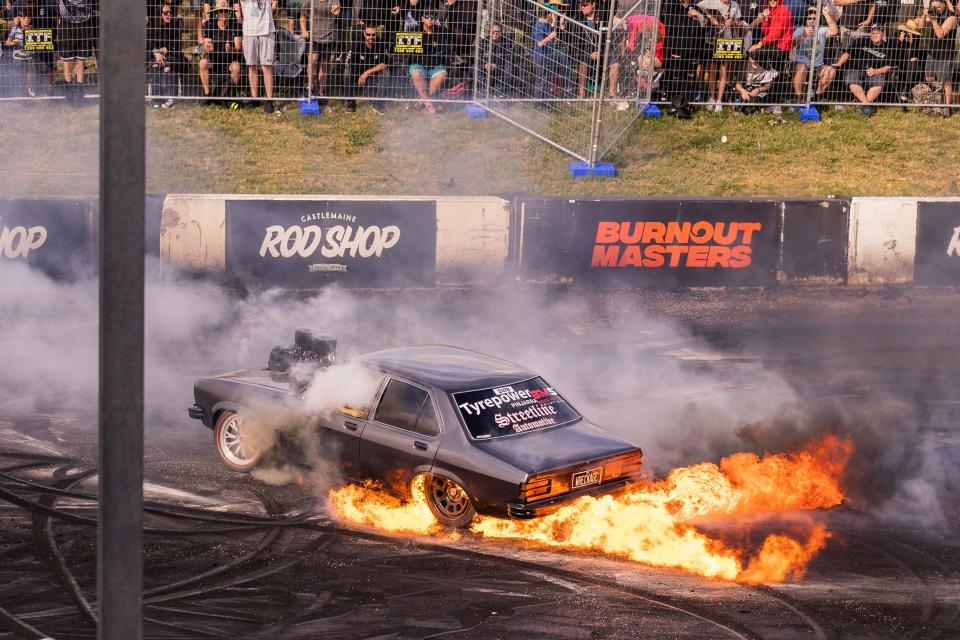 A car does a burnout during the Summernats car festival at the Exhibition Park in Canberra, Australia, Jan. 5, 2023. The 35th Summernats car festival kicked off here on Thursday. (Photo by Chu Chen/Xinhua via Getty Images)