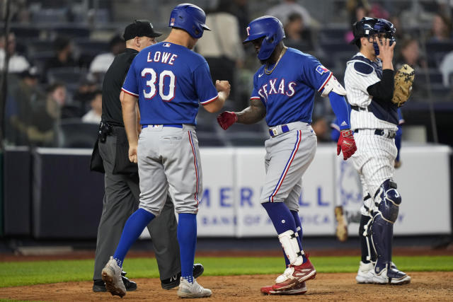 García's 2-run homer in the 10th lifts the Rangers over the