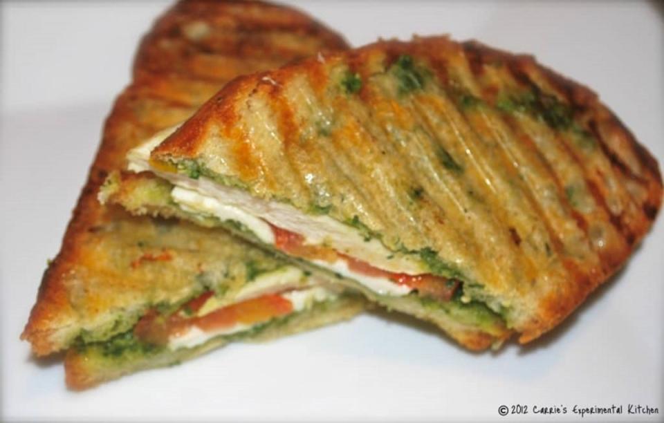 <p>Carries Experimental Kitchen</p><p>This Grilled Chicken & Pesto Panini made with Panella Italian bread on my indoor griddle is one of my family's favorite weeknight meals.</p><p><strong>Get the recipe: </strong><a href="https://www.carriesexperimentalkitchen.com/grilled-chicken-pesto-panini/" rel="nofollow noopener" target="_blank" data-ylk="slk:Grilled Chicken & Pesto Panini;elm:context_link;itc:0;sec:content-canvas" class="link "><strong>Grilled Chicken & Pesto Panini</strong></a></p><p><strong>Related: <a href="https://www.yahoo.com/lifestyle/42-hearty-soup-sandwich-combos-215348352.html" data-ylk="slk:42 Hearty Soup and Sandwich Combos We'll Never Tire Of;elm:context_link;itc:0;sec:content-canvas;outcm:mb_qualified_link;_E:mb_qualified_link;ct:story;" class="link  yahoo-link">42 Hearty Soup and Sandwich Combos We'll Never Tire Of</a></strong></p>