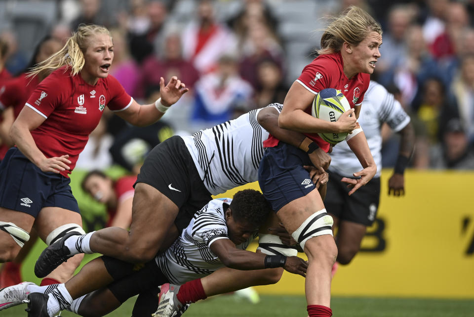 Zoe Aldcroft of England makes a run during the Women's Rugby World Cup pool match between England and Fiji, at Eden Park, Auckland, New Zealand, Saturday, Oct.8. 2022. (Andrew Cornaga/Photosport via AP)