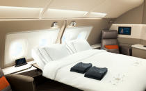 <p>The beds can be stowed away completely to create more room in the suite. The executive chairs are upholstered in Poltrona Frau leather, and can be fully adjusted with an electronic control side panel, which includes a variety of pre-set sitting and lounging positions. They can swivel between 135 and 270 degrees which makes them ideal work-chairs for the large desk area, or dining chairs for meals. They can also recline up to 45 degrees as comfortable lounge chairs for in-flight entertainment.</p> <p>Each suite features 32-inch full HD monitor which can be adjusted for different viewing angles in seat and bed modes with motorized controls. Suites also include a full-sized personal wardrobe, handbag stowage compartment, an amenity storage box lined with soft leather, custom carpeting and a feature wall with mood lighting.</p>