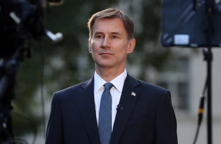 Conservative Party leadership candidate Jeremy Hunt attends an interview outside his home in London