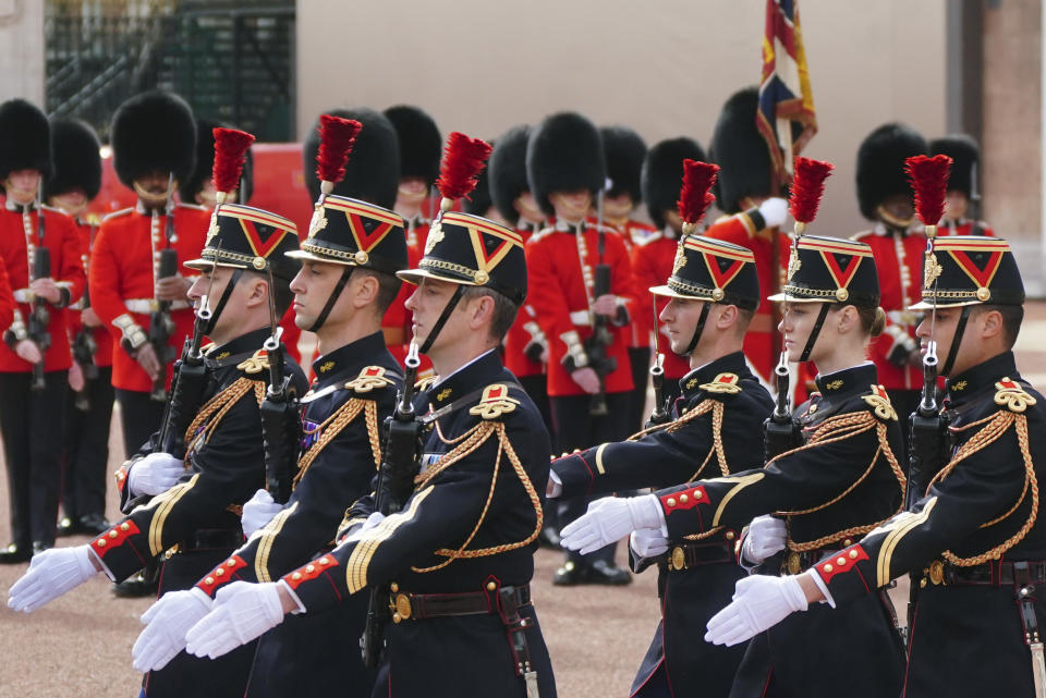 Troops from France's 1er Regiment de le Garde Republicaine partake in the Changing of the Guard ceremony at Buckingham Palace, to commemorate the 120th anniversary of the Entente Cordiale - the historic diplomatic agreement between Britain and France which laid the groundwork for their collaboration in both world wars, in London, Monday, April 8, 2024. France is the first non-Commonwealth country to take part in the Changing of the Guard. (Victoria Jones/Pool Photo via AP)