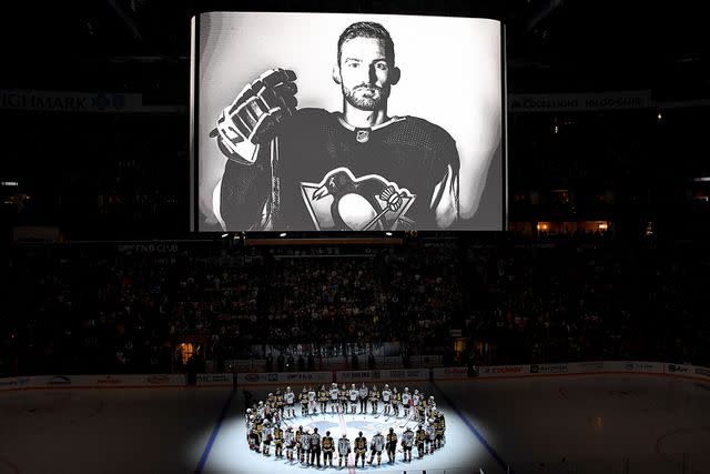 <p>Joe Sargent/NHLI via Getty Images</p> Adam Johnson remembered before the game between the Pittsburgh Penguins and the Anaheim Ducks at PPG PAINTS Arena on October 30, 2023 in Pittsburgh, Pennsylvania