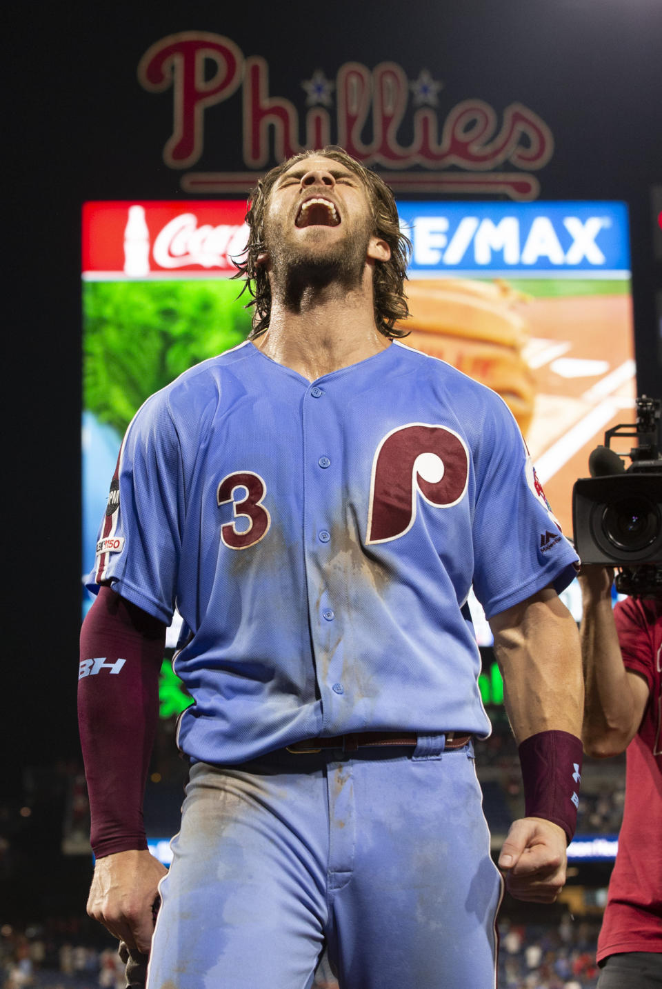 Philadelphia Phillies' Bryce Harper celebrates the team's win over the Chicago Cubs in a baseball game Thursday, Aug. 15, 2019, in Philadelphia. The Phillies won 7-5 on a grand slam by Harper in the ninth. (AP Photo/Chris Szagola)