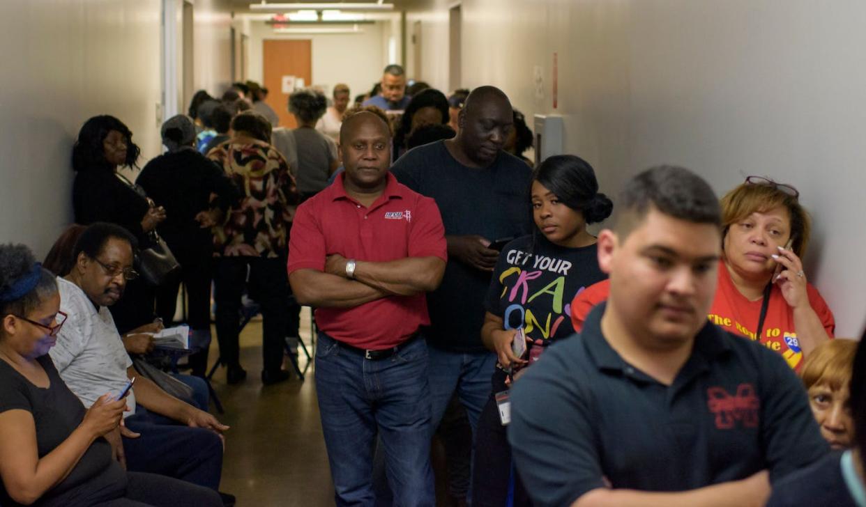Voters line up at a polling station in Houston to cast their ballots during the Texas presidential primary on March 3, 2020. <a href="https://www.gettyimages.com/detail/news-photo/voters-line-up-at-a-polling-station-to-cast-their-ballots-news-photo/1204959570?phrase=2020%20election%20voting%20lines%20houston&adppopup=true" rel="nofollow noopener" target="_blank" data-ylk="slk:Mark Felix/AFP via Getty Images;elm:context_link;itc:0;sec:content-canvas" class="link ">Mark Felix/AFP via Getty Images</a>