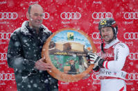 Skiing - Men's Alpine Ski World Cup Slalom - Val d´Isere, France - December 10, 2017 Austria's Marcel Hirscher celebrates on the podium after winning the Men's Alpine Ski World Cup Slalom REUTERS/Christian Hartmann