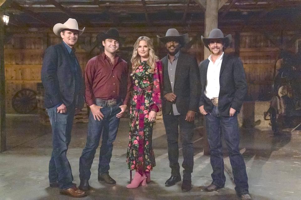 four farmers and singer jennifer nettles stand in a barn
