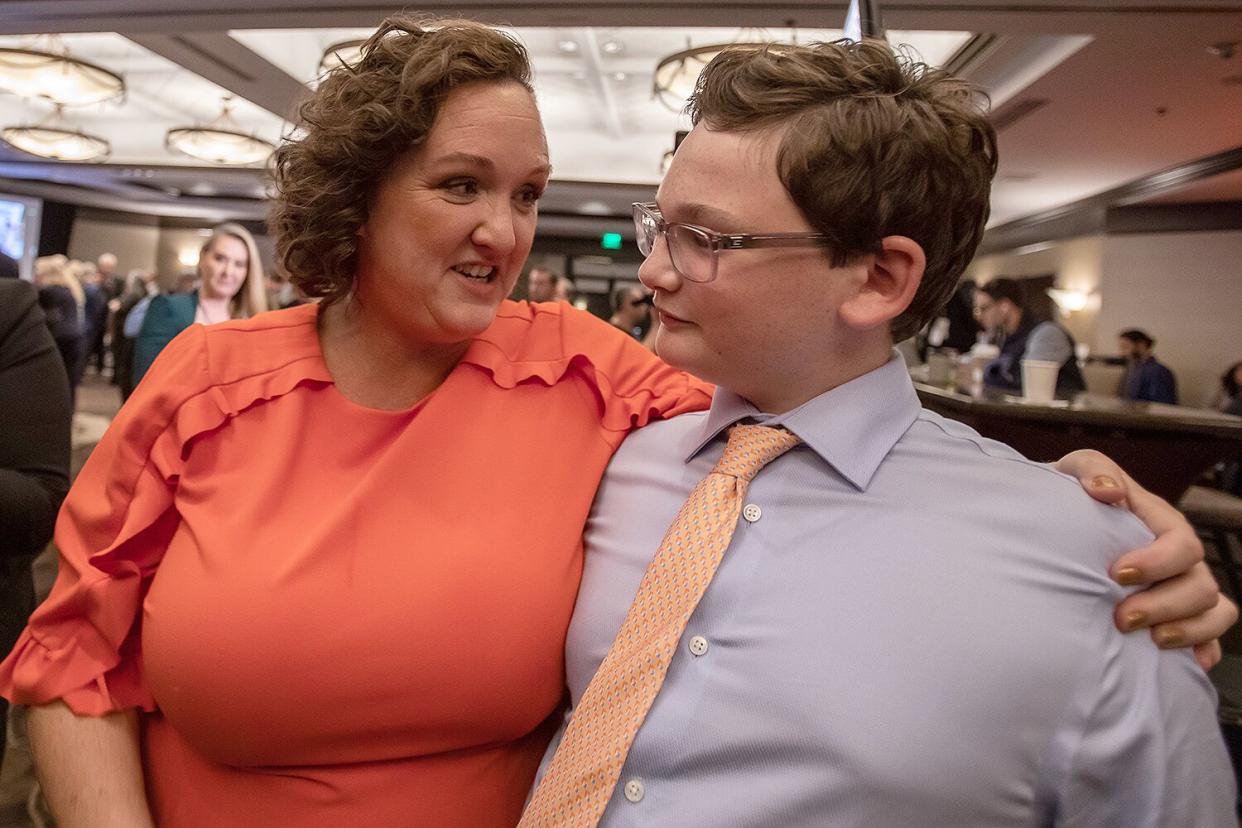 Rep. Katie Porter (D-CA) embraces her son Paul Hoffman after speaking at an election night watch party at the Hilton Orange County Hotel on November 8, 2022 in Costa Mesa, California.