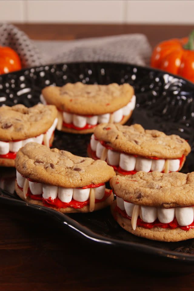 <p>This recipe comes together with just a couple of mini marshmallows, chocolate chip cookies, and red frosting.</p><p><em><strong>Get the recipe at <a href="https://www.delish.com/cooking/recipe-ideas/recipes/a55668/dracula-dentures-recipe/" rel="nofollow noopener" target="_blank" data-ylk="slk:Delish;elm:context_link;itc:0;sec:content-canvas" class="link ">Delish</a>.</strong></em></p>
