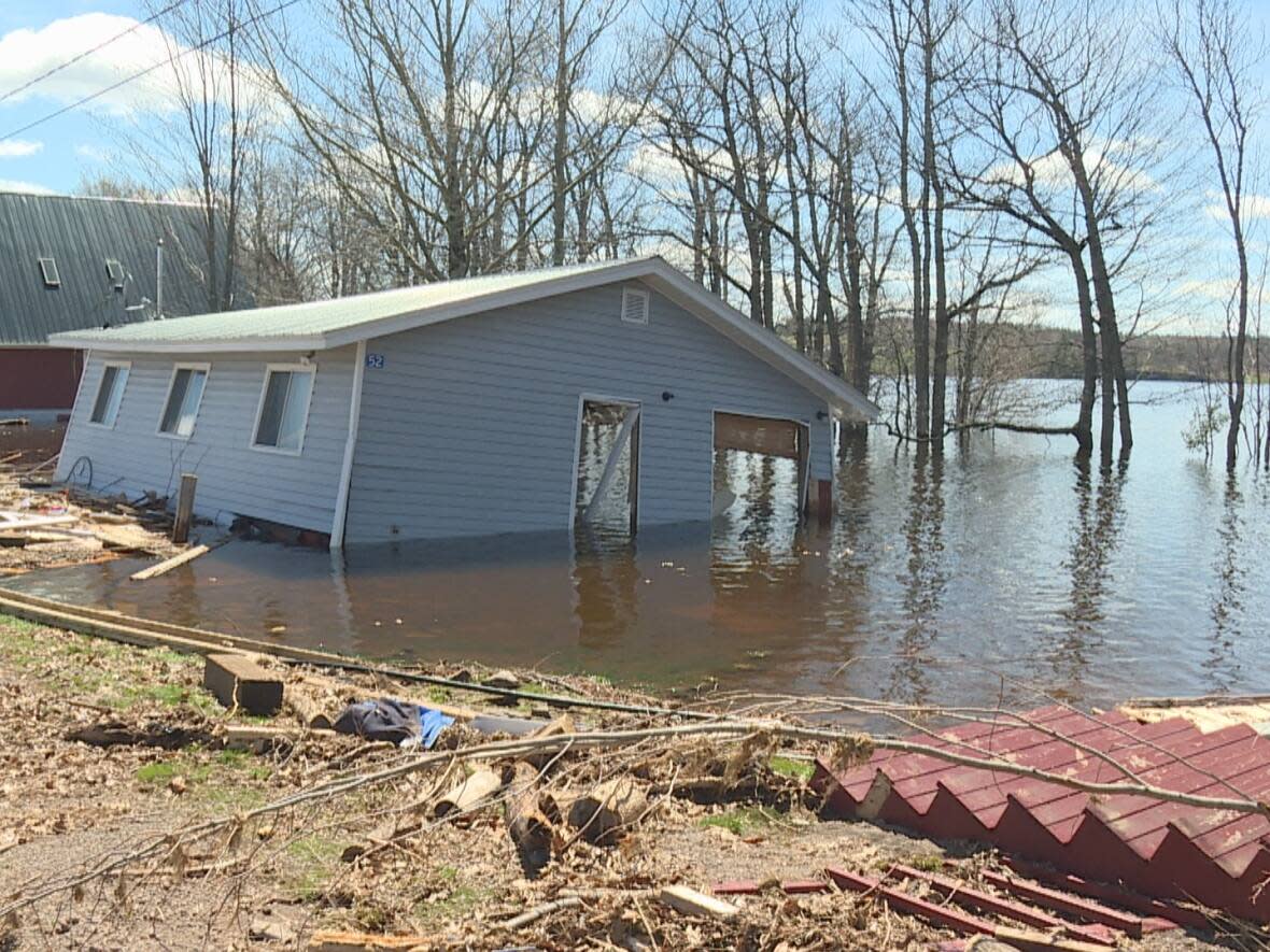 Flooding in 2018 caused millions of dollars in damage to property. New Brunswick's Emergency Measure's Organization and the Department of Environment say it is too soon to predict this year's flood season. (Shane Fowler/CBC - image credit)