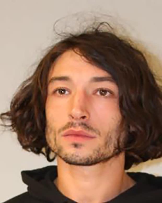 In this handout image provided by Hawaiʻi Police Department, Ezra Miller is seen in a police booking photo after their arrest for second-degree assault on April 19, 2022 in Pahoa, Hawaii.<p><a href="https://www.gettyimages.com/detail/1240094797" rel="nofollow noopener" target="_blank" data-ylk="slk:Handout/Getty Images;elm:context_link;itc:0;sec:content-canvas" class="link ">Handout/Getty Images</a></p>