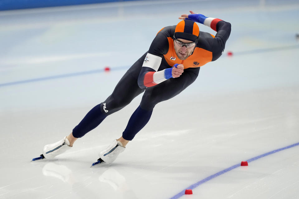 Thomas Krol of the Netherlands competes during the men's speedskating 1,000-meter finals at the 2022 Winter Olympics, Friday, Feb. 18, 2022, in Beijing. (AP Photo/Ashley Landis)