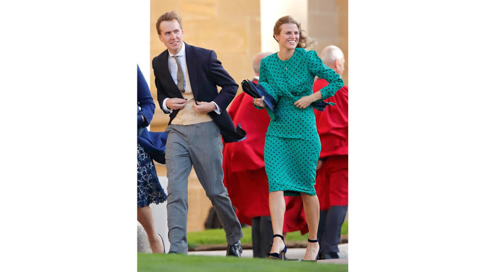 Harry Cobb and Eliza Cobb attend the wedding of Princess Eugenie of York and Jack Brooksbank at St George's Chapel on October 12, 2018