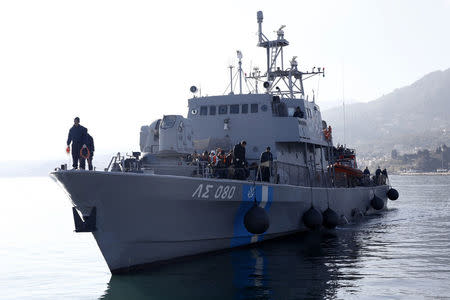 Greek Coast Guard vessel Agios Efstratios, carrying refugees and migrants following a rescue operation, approaches the port of the Greek island of Lesbos, February 8, 2016. Picture taken February 8, 2016. REUTERS/Giorgos Moutafis