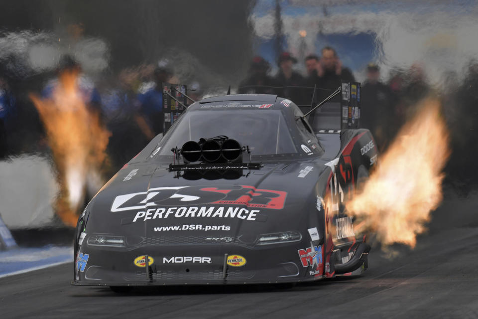 In this photo provided by the NHRA, Matt Hagan drives in Funny Car qualifying Friday, June 11, 2021, at the TascaParts.com NHRA New England Nationals drag races in Epping, N.H. (Auto Imagery/NHRA via AP)