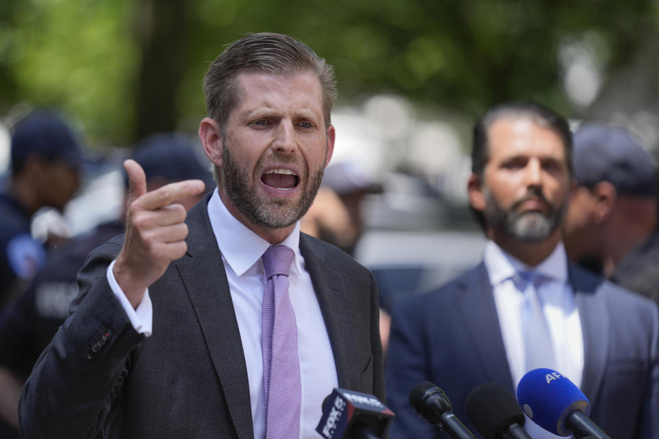 Eric Trump speaks to reporters across the street from former President Donald Trump's criminal trial in New York, Tuesday, May 28, 2024. (AP Photo/Seth Wenig)