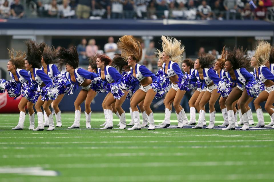 <p>The Dallas Cowboys cheerleaders perform on the field prior to the game against the Washington Redskins at AT&T Stadium on November 24, 2016 in Arlington, Texas. (Photo by Tom Pennington/Getty Images) </p>