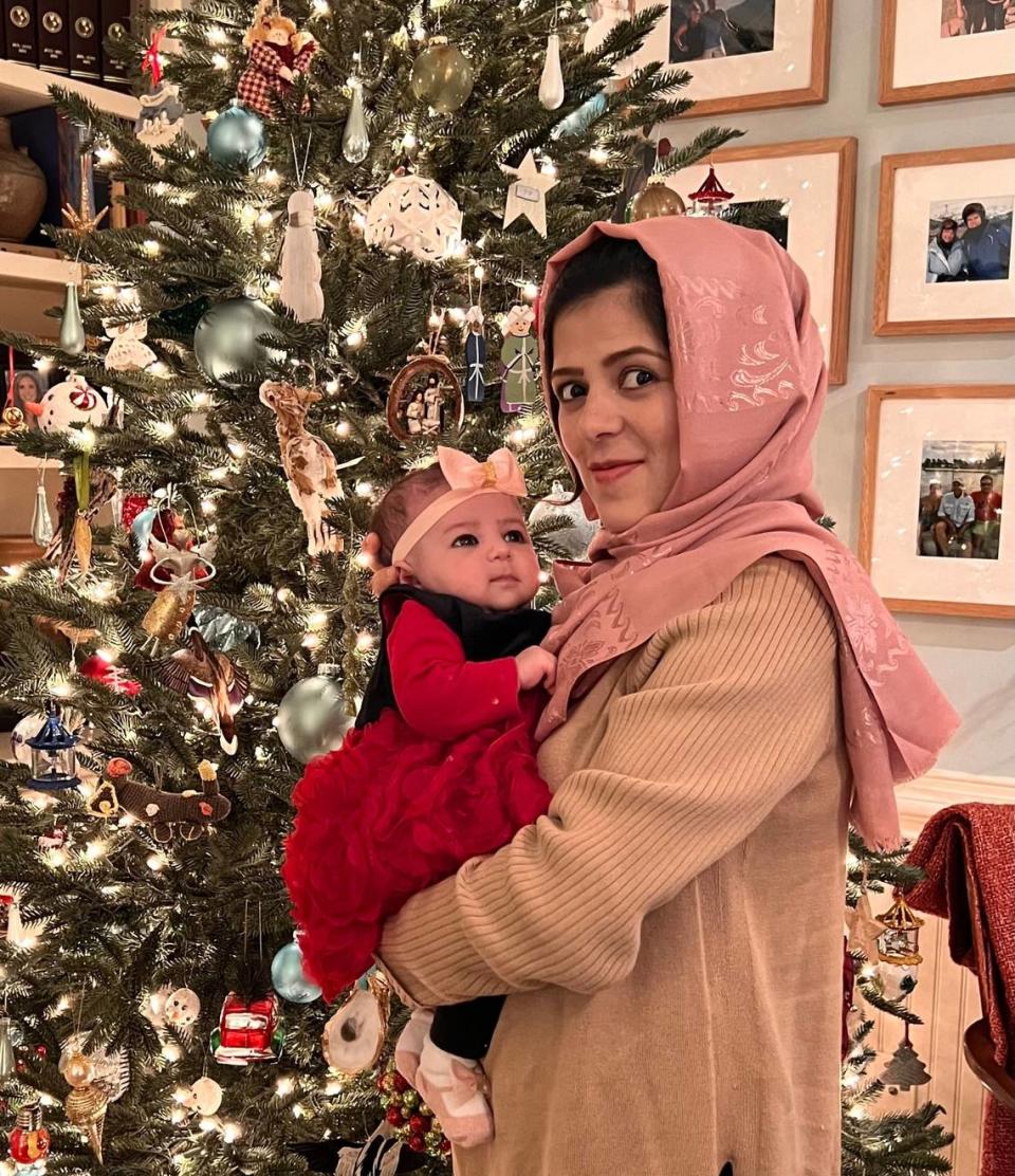 Nabila Rasoul, shown with her baby daughter Diyana during the 2021 holiday season, was killed - along with Dina Fernandez, her English tutor - when a truck crashed into them as they were walking on an east Charlotte sidewalk in February 2022.