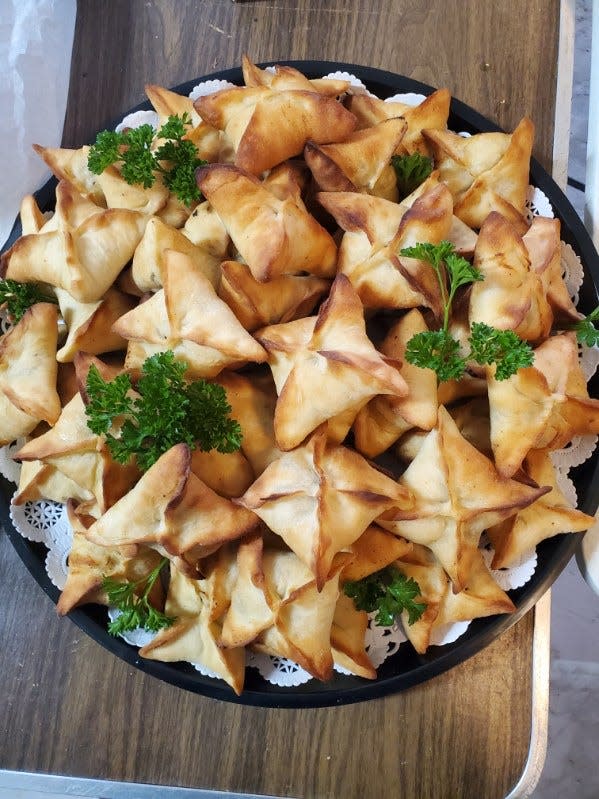 Fatayeh pies are offered in meat and spinach varieties at the Lebanese Festival in Fairlawn.