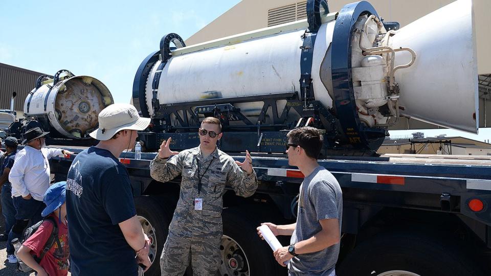 Staff Sgt. Cote Welliver answers questions about Minuteman III intercontinental ballistic missile motors. A Defense Department audit found 71 ballistic missile motors at Hill Air Force Base, Utah, were erroneously listed as not working. (Alex Lloyd/U.S. Air Force)