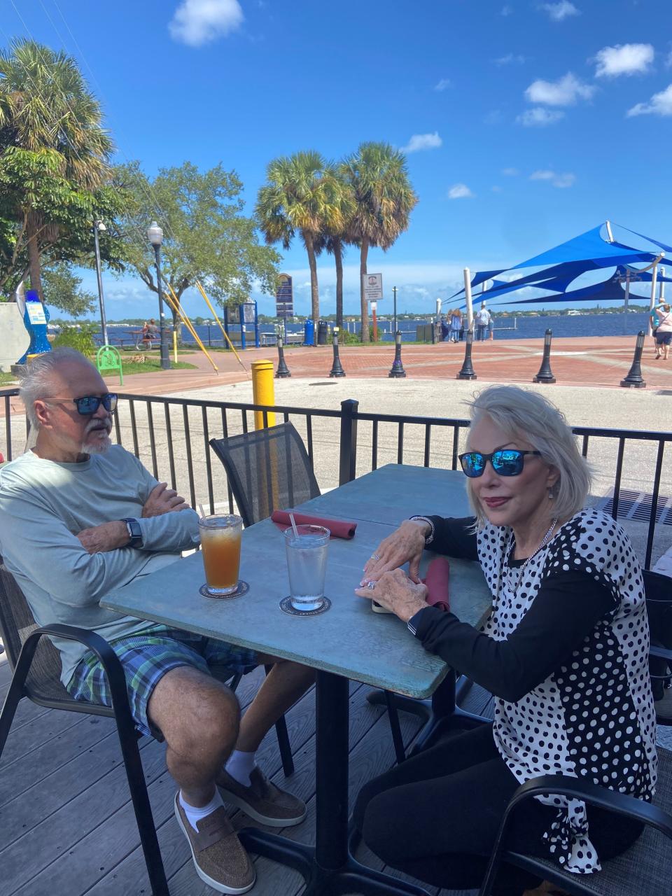 Chrissy Cera, a Hobe Sound resident visiting downtown Stuart with her husband, Lou Cera, anticipates Brightline passenger service from Miami to Orlando to be loud. Service began Friday, Sept. 22, 2023.