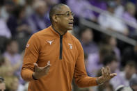 Texas head coach Rodney Terry questions a call during the first half of an NCAA college basketball game against Kansas State Wednesday, March 13, 2024, in Kansas City, Mo. (AP Photo/Charlie Riedel)