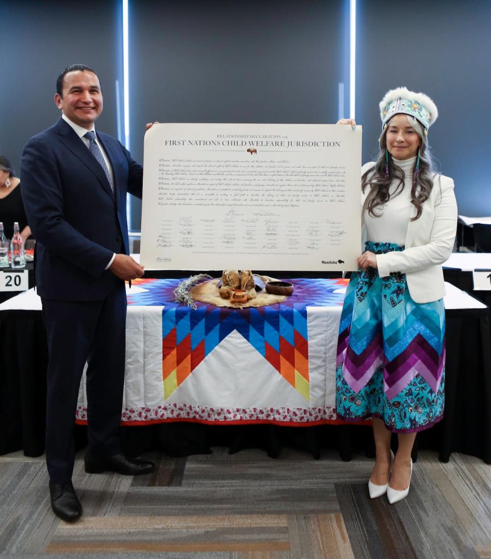 Manitoba Premier Wab Kinew, left, and Families Minister Nahanni Fontaine met with nearly 40 Indigenous leaders on Monday to sign a relationship declaration pledging the transfer of jurisdiction over child welfare to Manitoba First Nations.