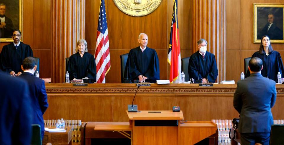 In this file photo, members of the N.C. Supreme Court stand before a recess in May 2022. At the time, the court had a 4-3 Democratic majority but the changed with the November 2022 election. The court now has a 5-2 Republican majority, which agreed to rehear cases on voter ID and gerrymandering.