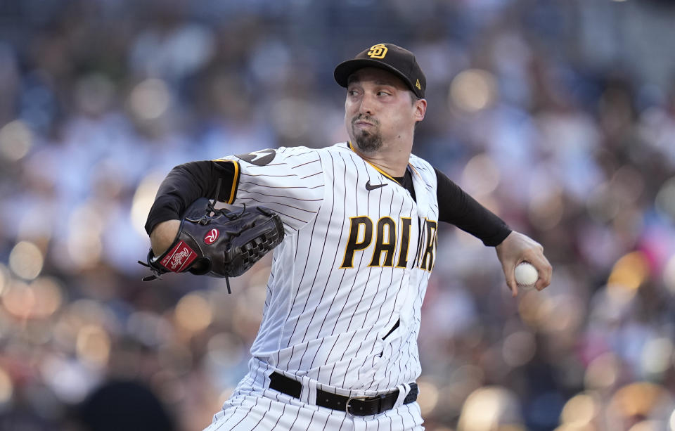 FILE - San Diego Padres starting pitcher Blake Snell works against a San Francisco Giants batter during the second inning of a baseball game Sept. 2, 2023, in San Diego. Snell won the National League Cy Young Award on Wednesday, Nov. 15, after leading the majors in ERA for the Padres, becoming the seventh pitcher to earn baseball's top pitching prize in both leagues. The free-agent lefty received 28 of 30 first-place votes in balloting by the Baseball Writers' Association of America. (AP Photo/Gregory Bull, File)