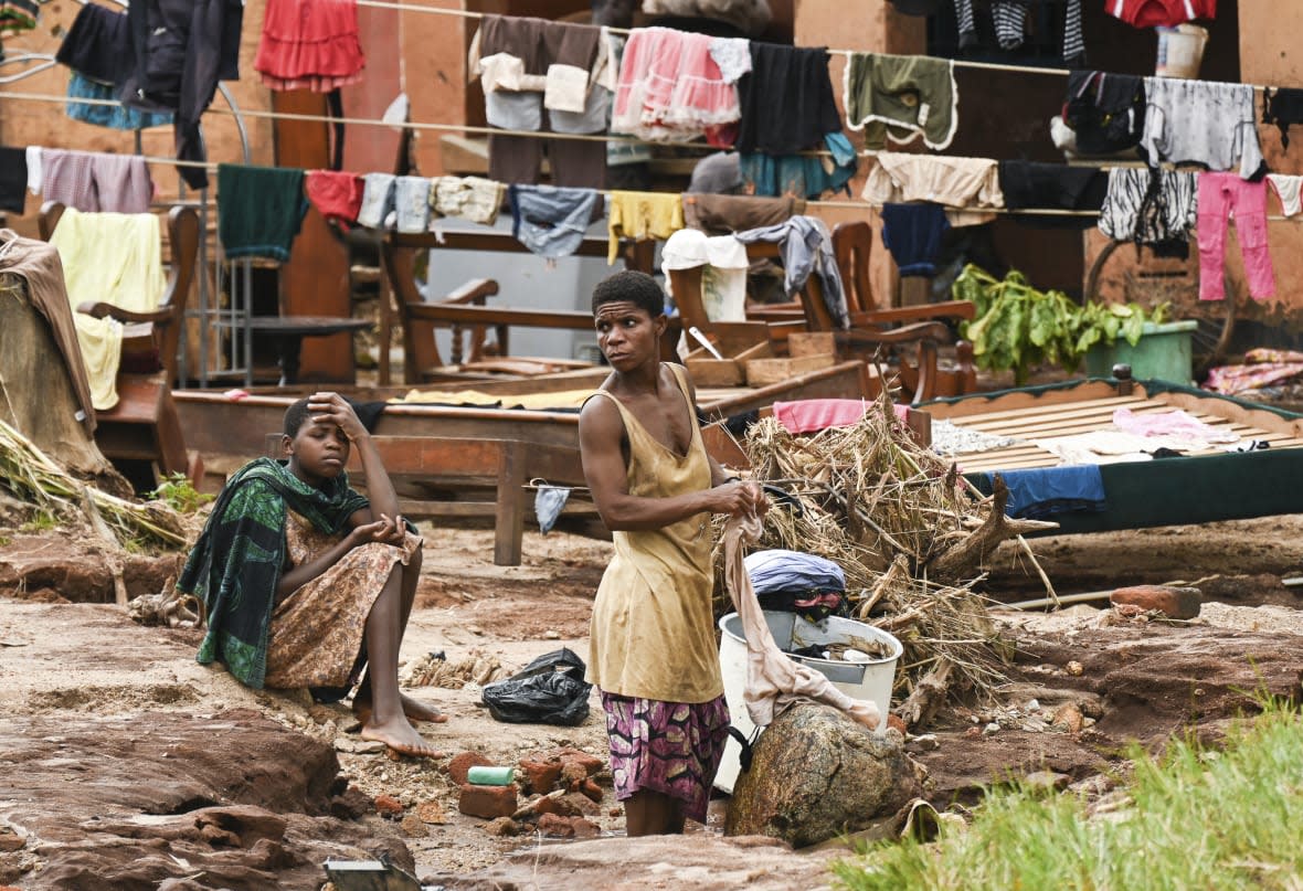Clothes are hung out to dry on called electrical power lines caused by last week’s heavy rains caused by Tropical Cyclone Freddy in Phalombe, southern Malawi Saturday, March 18, 2023. Authorities are still getting to grips with destruction in Malawi and Mozambique with over 370 people confirmed dead and several hundreds still displaced or missing. (AP Photo/Thoko Chikondi)