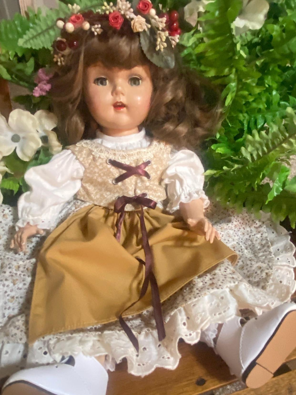 Mary Lee's composition doll is dressed for the Harvey One-Room School's May Day event. Any doll may be entered between 1-2 p.m. on May 1. Ribbons and prizes will be awarded. A parade with dolls in wagons will follow.