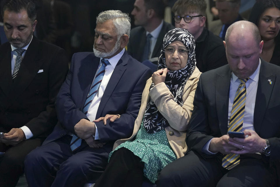 Humza Yousaf's parents, Muzaffar Yousaf, second from left, and Shaaista Bhutta, second from right, attend the announcement of the new Scottish National Party leader and the next First Minister of Scotland, at Murrayfield Stadium, in Edinburgh, Scotland, Monday, March 27, 2023. Scotland’s governing Scottish National Party elected Humza Yousaf as its new leader on Monday after a bruising five-week contest that exposed deep fractures within the pro-independence movement. The 37-year-old son of South Asian immigrants is set to become the first person of color to serve as Scotland’s first minister. (Andrew Milligan/PA via AP)