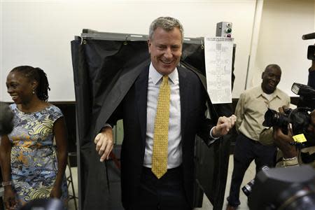 New York City democratic mayoral candidate Bill de Blasio exits a voting booth in the Brooklyn borough of New York after voting in the democratic primary election September 10, 2013. REUTERS/Brendan McDermid