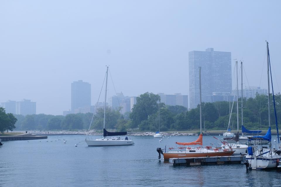 A portion of the Chicago's skyline viewed from the North Side is obstructed by smoke on June 28, 2023.