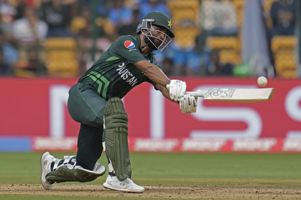 Pakistan's Fakhar Zaman hits a boundary during the ICC Men's Cricket World Cup match between New Zealand and Pakistan in Bengaluru, India, Saturday, Nov. 4, 2023. (AP Photo/Aijaz Rahi)