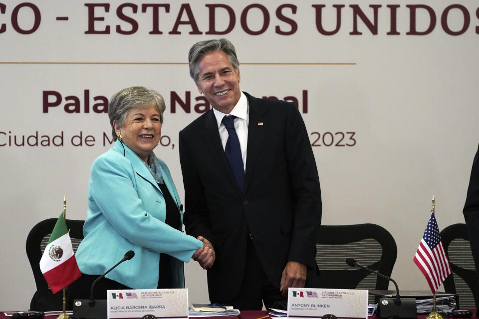 Mexican Secretary of Foreign Affairs Alicia Bárcena, left, and U.S. Secretary of State Antony Blinken shake hands during a meeting on security at the National Palace in Mexico City, Thursday, Oct. 5, 2023. (AP Photo/Marco Ugarte)