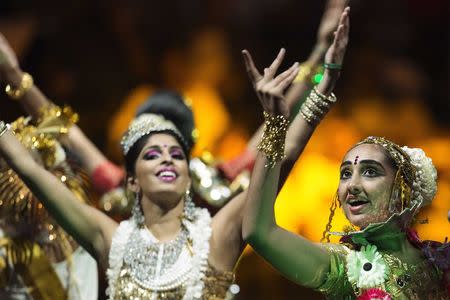 Dancers perform before India's Prime Minister Narendra Modi speaks at Madison Square Garden in New York, during his visit to the United States, September 28, 2014. REUTERS/Lucas Jackson