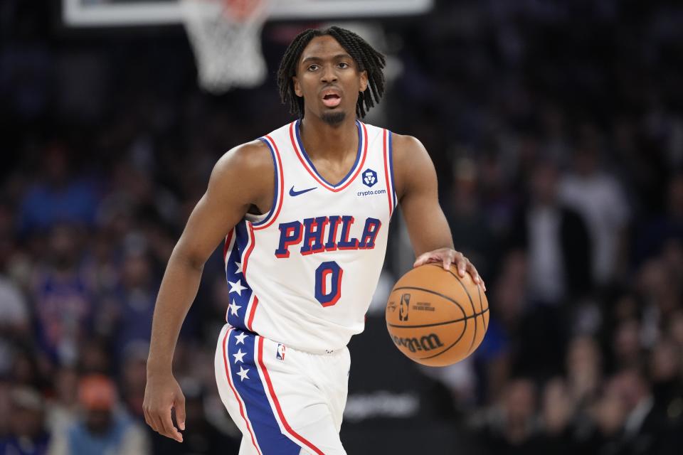 Philadelphia 76ers' Tyrese Maxey (0) looks to pass during the first half of Game 5 in an NBA basketball first-round playoff series against the New York Knicks, Tuesday, April 30, 2024, in New York. (AP Photo/Frank Franklin II)