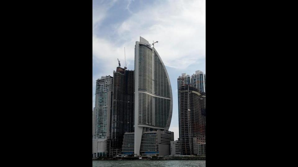 This July 4, 2011, file photo, shows what was then the Trump Ocean Club International Hotel and Tower, third building from left, in Panama City, Panama.