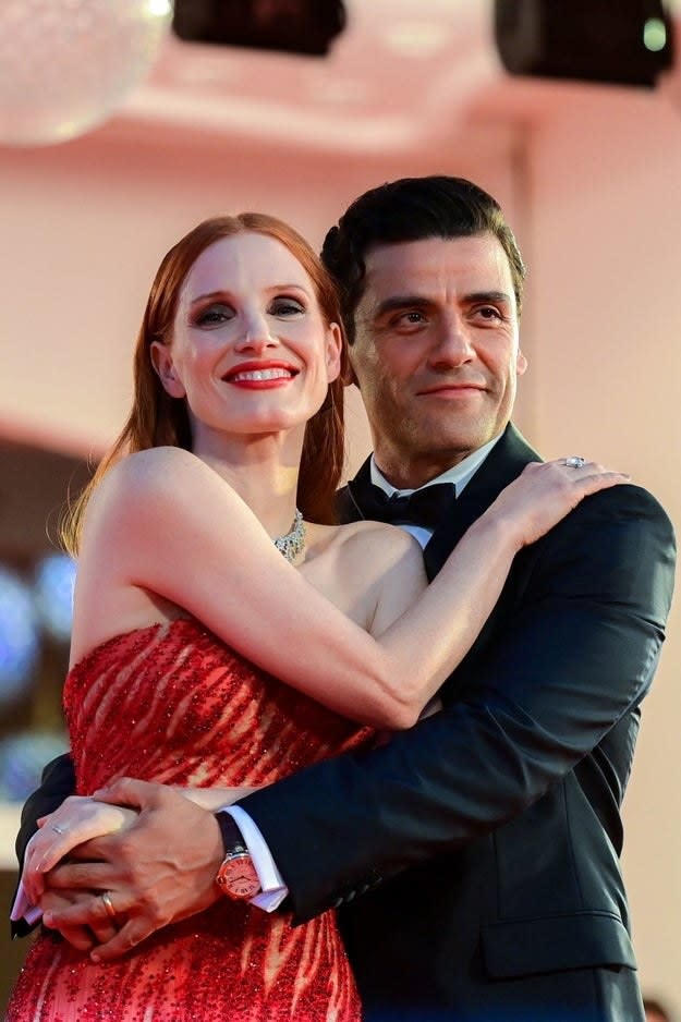 Jessica Chastain and Oscar Isaac pose at the "Scenes from a Marriage" screening on September 4, 2021 at the Venice Film Festival