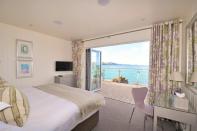 <p>If beachside bliss, bay-hopping boat rides, rock pooling and top-notch beach barbecues appeal, <a href="https://www.booking.com/hotel/gb/cary-arms-babbacombe-torquay.en-gb.html?aid=2070935&label=coastal-retreats" rel="nofollow noopener" target="_blank" data-ylk="slk:Cary Arms & Spa;elm:context_link;itc:0;sec:content-canvas" class="link ">Cary Arms & Spa</a> should be on your must-visit list. This luxury UK coastal retreat is simply bursting with charm. </p><p>There's a host of beach-chic accommodation to choose from, including beach huts and suites and h0liday cottages for larger groups. And the hotel's own classic sailing boat means you can explore the surrounding coves and bays in style. It's a little slice of heaven in Devon.</p><p><a class="link " href="https://www.booking.com/hotel/gb/cary-arms-babbacombe-torquay.en-gb.html?aid=2070935&label=coastal-retreats" rel="nofollow noopener" target="_blank" data-ylk="slk:CHECK AVAILABILITY;elm:context_link;itc:0;sec:content-canvas">CHECK AVAILABILITY</a></p><p>We want to help you stay inspired. <a href="https://hearst.emsecure.net/optiext/optiextension.dll?ID=7YU7qVoYVtfwDQ9FRmu13FlJO1voc2zWFpXEkCOg3fHM93yYTOZhzXhAkCYFJ0k4z8Lej9Pfnfdp7K" rel="nofollow noopener" target="_blank" data-ylk="slk:Sign up;elm:context_link;itc:0;sec:content-canvas" class="link ">Sign up</a> for the latest travel tales and to hear about our financially protected escapes and bucket list adventures.</p><p><a class="link " href="https://hearst.emsecure.net/optiext/optiextension.dll?ID=7YU7qVoYVtfwDQ9FRmu13FlJO1voc2zWFpXEkCOg3fHM93yYTOZhzXhAkCYFJ0k4z8Lej9Pfnfdp7K" rel="nofollow noopener" target="_blank" data-ylk="slk:SIGN UP;elm:context_link;itc:0;sec:content-canvas">SIGN UP</a></p>