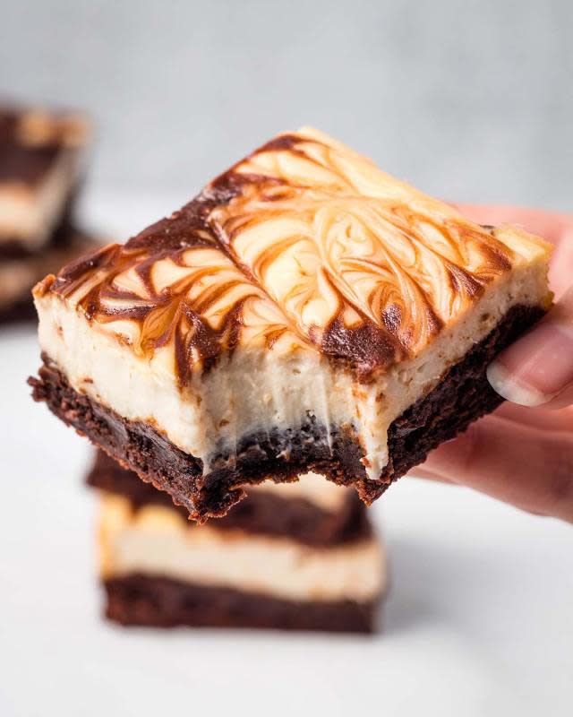 <p>Karissa's Vegan Kitchen</p><p>These vegan cheesecake brownies start with a rich, fudgy brownie layer and are topped with a layer of creamy, tangy cheesecake. Nut-free!</p><p><strong>Get the recipe: <a href="https://www.karissasvegankitchen.com/vegan-cheesecake-brownies/" rel="nofollow noopener" target="_blank" data-ylk="slk:Dairy-Free Vegan Cheesecake Brownies;elm:context_link;itc:0;sec:content-canvas" class="link "><em>Dairy-Free Vegan Cheesecake Brownies</em></a></strong></p>