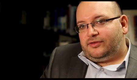 Jason Rezaian, the Washington Post's Tehran correspondent, is pictured at The Washington Post in Washington, DC in this November 6, 2013 handout photo. REUTERS/Zoeann Murphy/The Washington Post/Handout via Reuters/Files